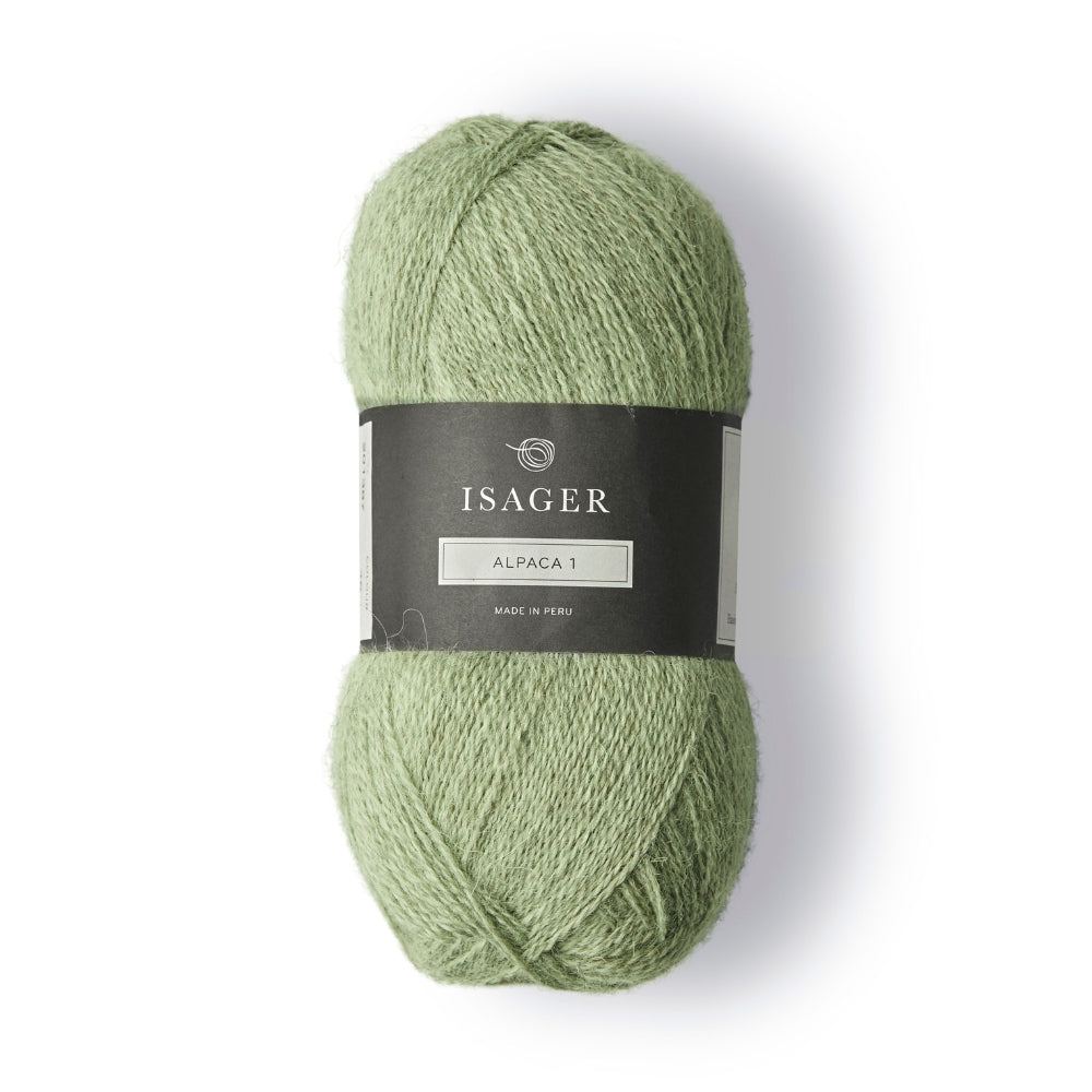 Weiches, ultrafeines Alpaka-Garn von Isager in Hellgrün. Ideal für feine Strickprojekte und zum Kombinieren mit anderen Garnen.